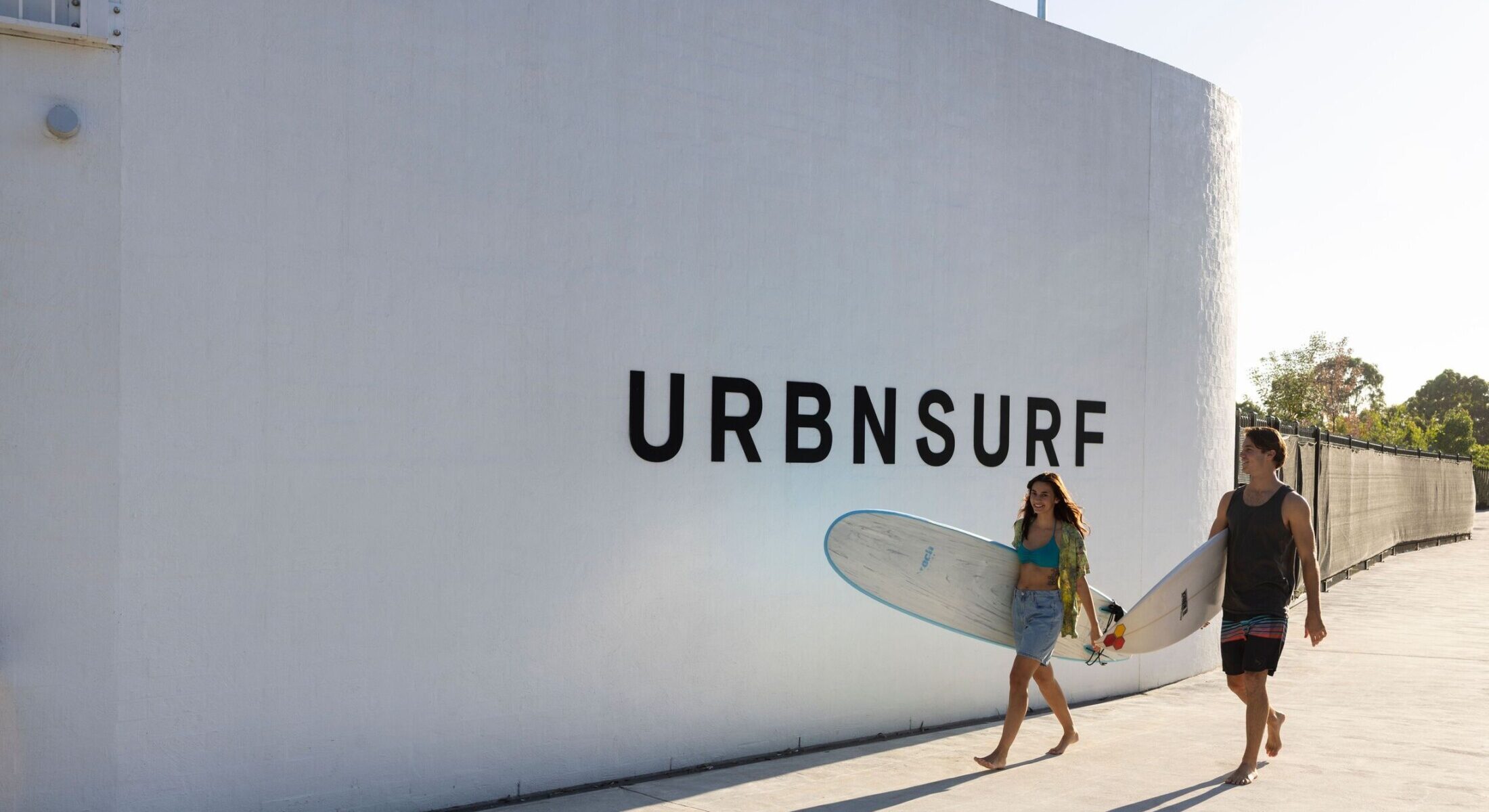 Couple arrives at Australia's best urban surfpark, URBNSURF, Homebush